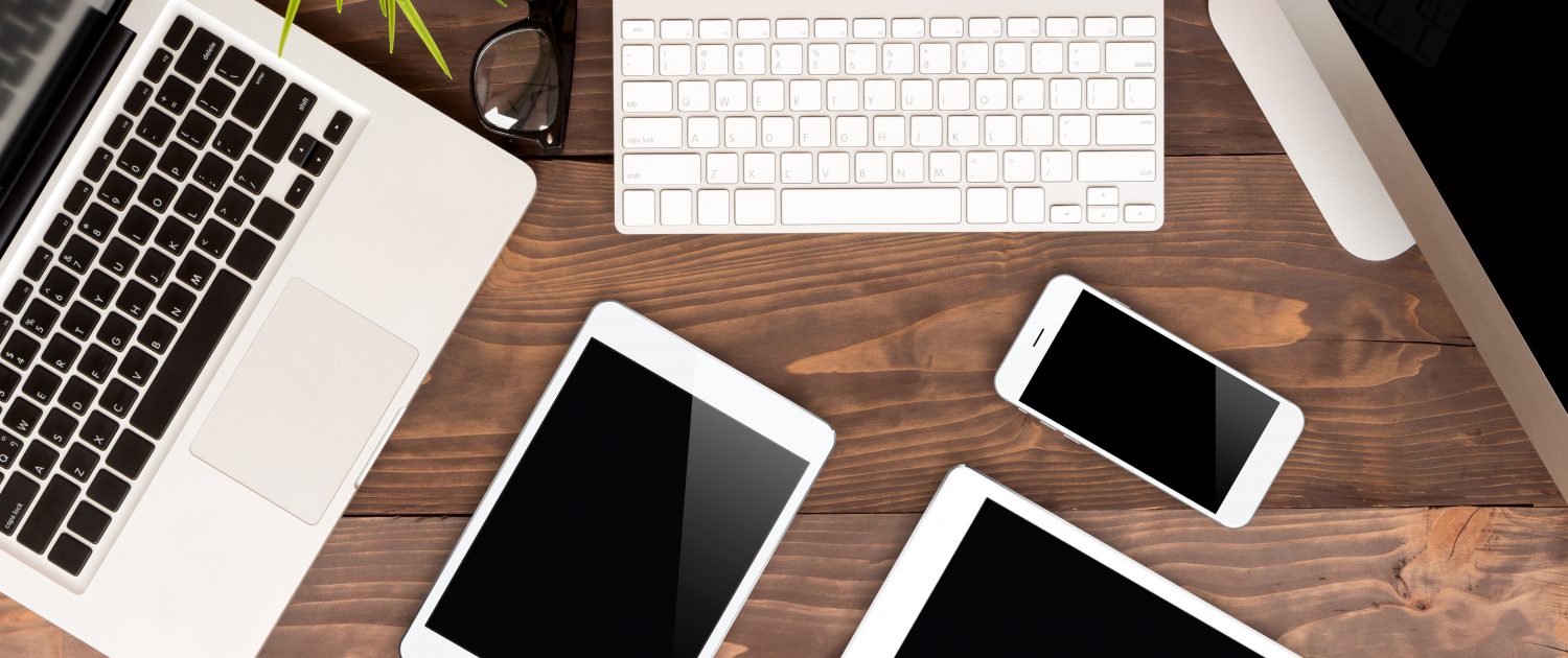 communicator technology on wood table top view